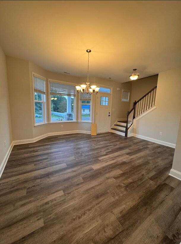 Building Photo - Sign a 12-month lease now and receive the ...