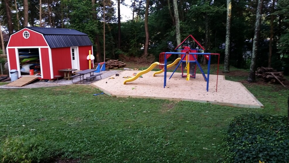 a similar playground will be on site, shed will be available for storage/ lawnmower provided - 103 Wingfield Dr