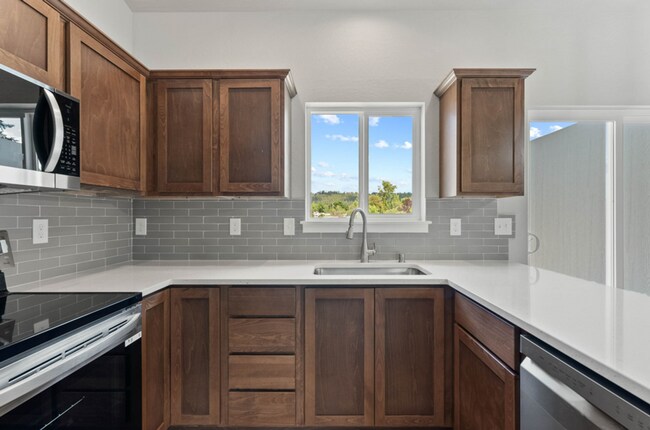 Building Photo - Newly Built 4 Bedroom Duplex With Yard