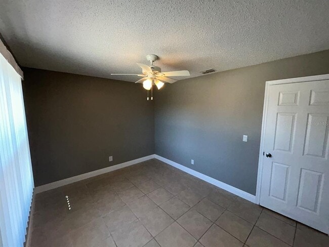 Building Photo - 6525 Manila Palm Way