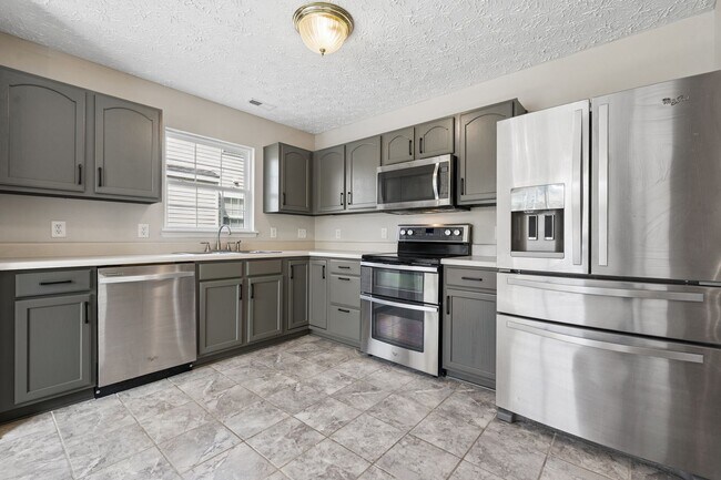 Building Photo - Welcoming 4-bed, 2.5-bath home in Durham offers thoughtful touches throughout.