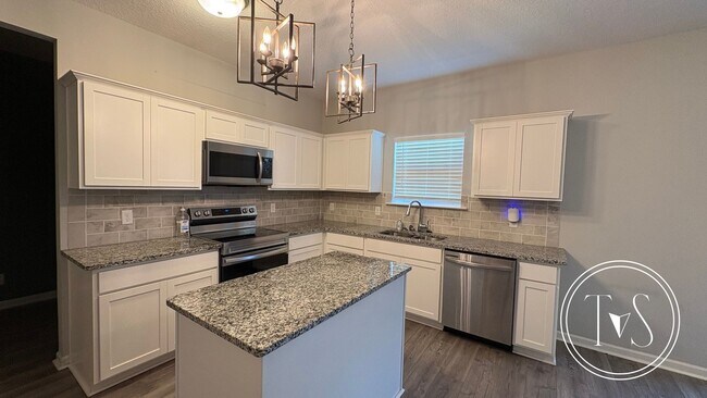 Building Photo - SUMMER MOVE-IN SPECIAL AND RATE DROP ALERT...
