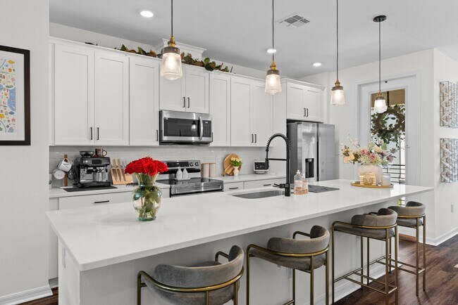 Building Photo - Upgraded 3BR/3.5BA Laureate Park Townhome | 2-Car Garage + EV Charging
