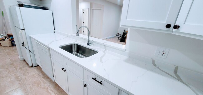 Building Photo - 3-Story Townhouse with Central Heat, AC and 2 Parking Spots Included