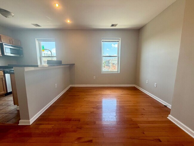 Building Photo - Stunning 1-Bed/1-Bath Apartment with Private Roof Deck and Parking Spot! Available NOW!