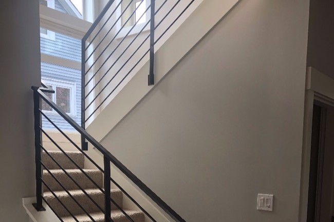 Staircase to upper level - 7040 Alonzo Ave NW