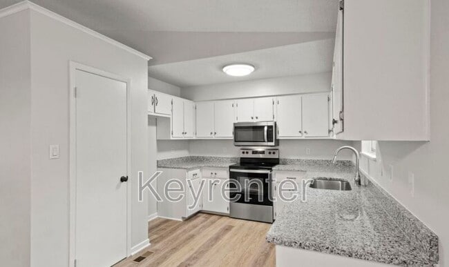 Building Photo - 6600 Woodcock Cir