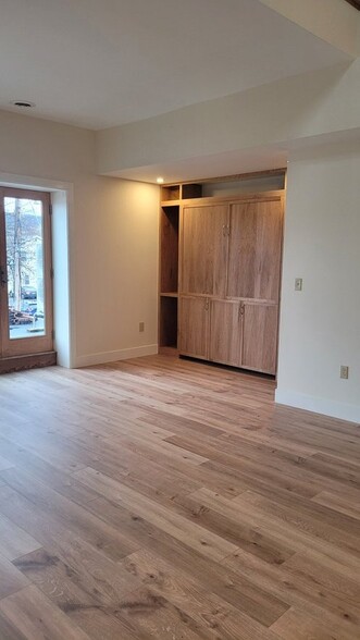 1st floor Murphy bed and bookshelves - 208 N Franklin St