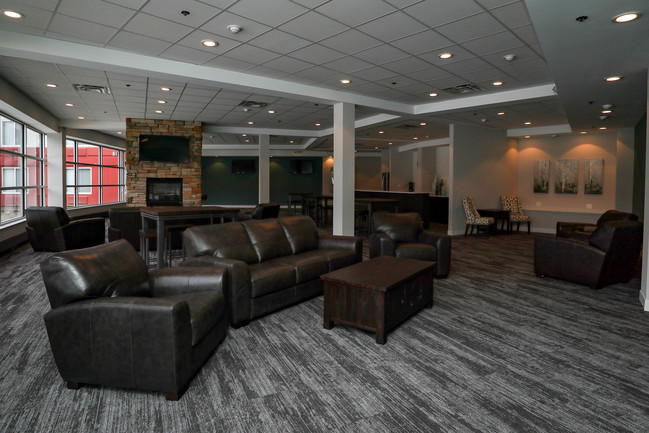 Club room with several seating areas - Creekview Court