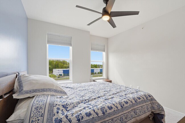 Building Photo - Perfectly positioned near the vibrant shopping and dining destination of One Loudoun, this reside...