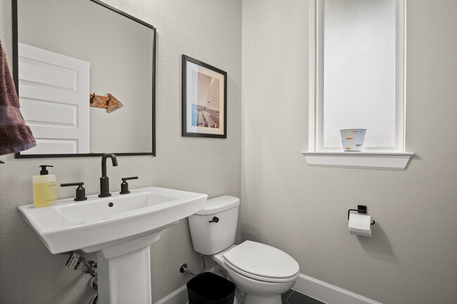 Additional half bath on first floor. - 1003 Cardinal Ln