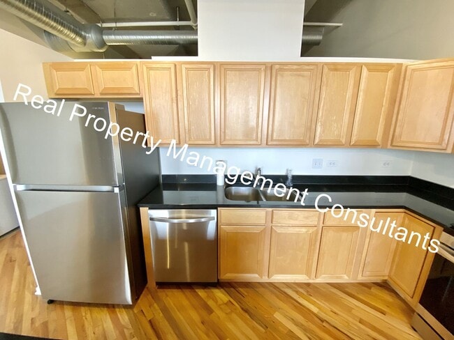 Building Photo - 2-Bedroom  in Western Auto Lofts