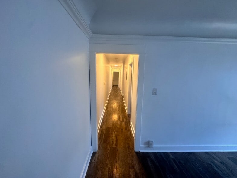 Hall to 2 of the bedrooms and bath - 1261 1/2 S Plymouth Blvd