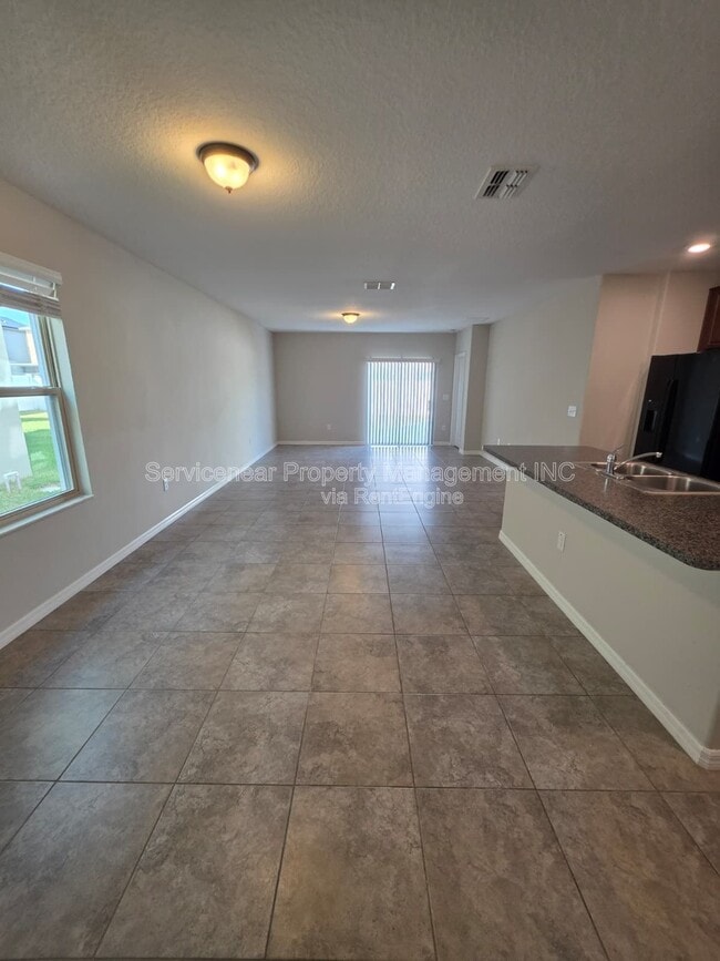 Building Photo - 7418 Rosy Periwinkle Ct