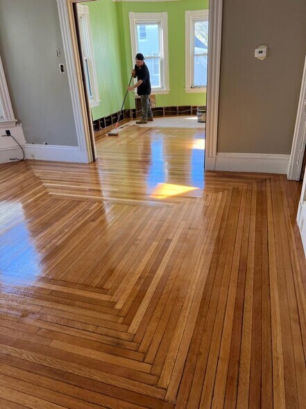 Newly refinished original hardwood floors - 56 State St