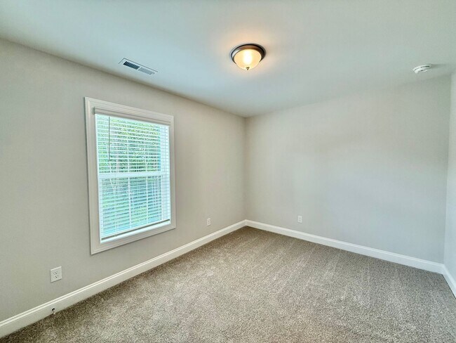 Building Photo - Stunning Newly Built 3BD, 3.5BA Fuquay Varina Townhome Near Shopping and Dining
