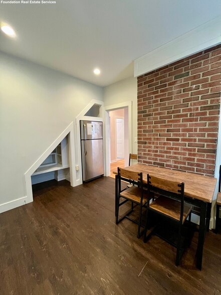 Kitchen with exposed brick - 79 Elmira St