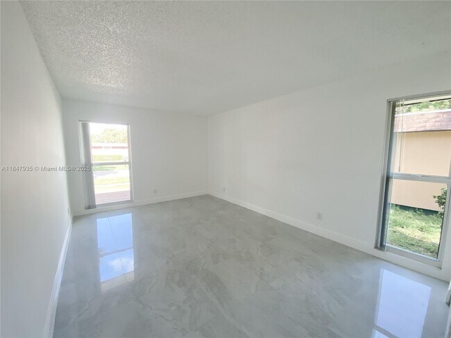 Building Photo - 7805 NW 67th Ave