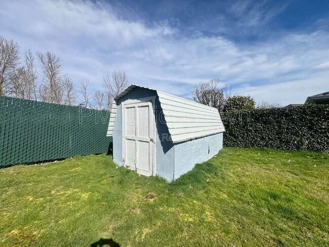 Building Photo - 6999 SE Norbert Dr