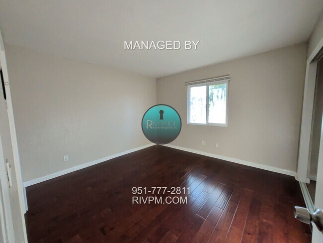 Building Photo - Modern Corona Condo with Garage!