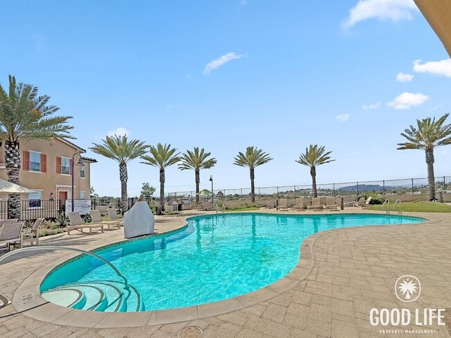 Building Photo - Bright 3BD/2.5BA Townhouse in Vista with Community Pool, In-Unit Laundry & 2-Car Garage