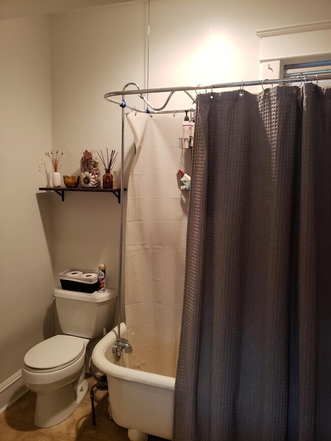 Bathroom with claw foot tub - 705 NE 73rd Ave