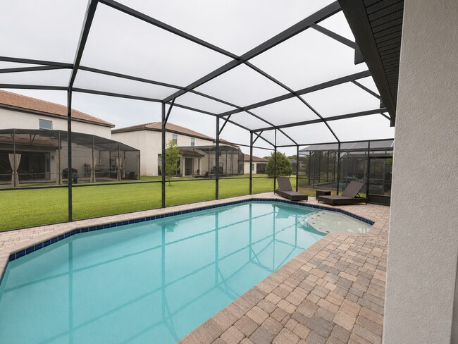 Building Photo - Expansive 6-Bed, 6.5-Bath on Angela's Avenue – Your Perfect Haines City Haven!