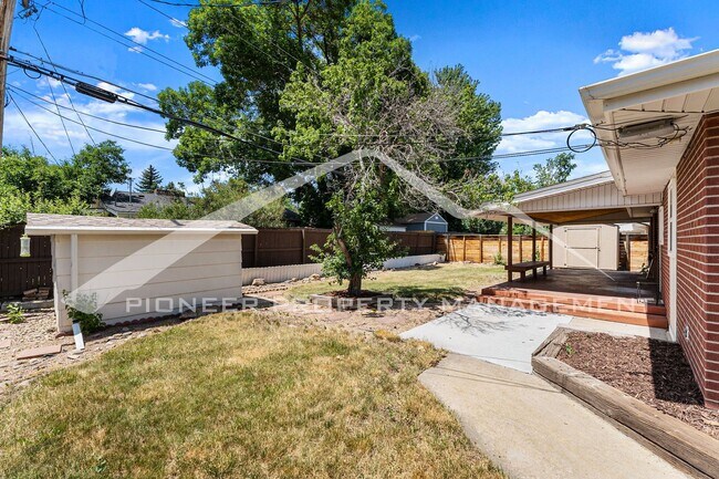 Building Photo - Spacious Home with Fenced Yard and Central AC