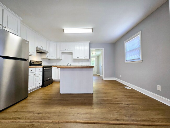 Building Photo - For Rent – Updated 3 Bedroom, 2 Bath Brick...