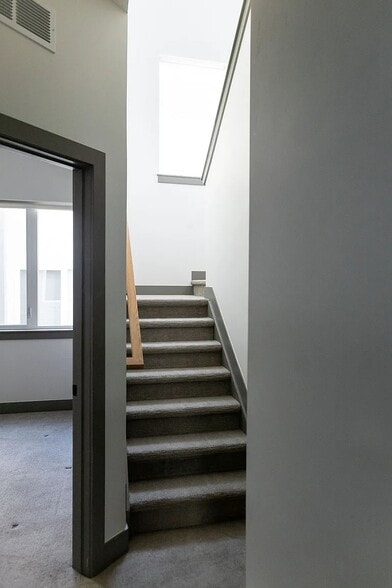 Stairs up to the private rooftop - 3505 S Marion St