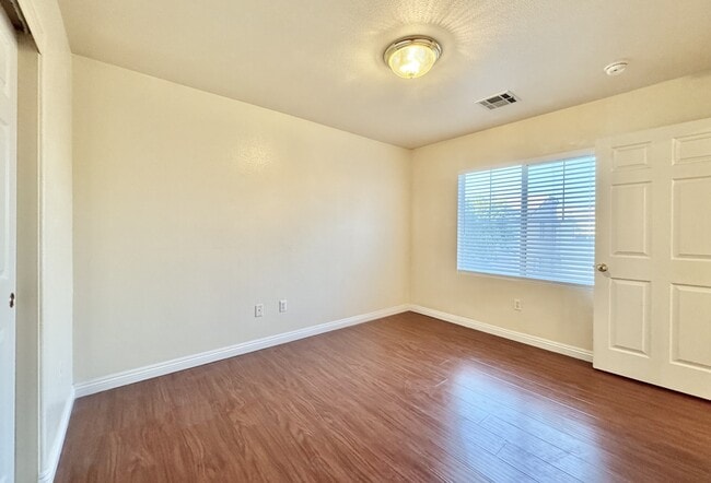 Building Photo - 8171 Golden Flowers St