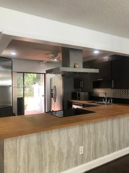 Kitchen and sliding door out front - 2972 NW 67th Ct