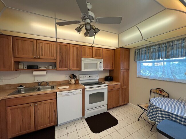 Building Photo - *55+ Community* 2nd floor furnished Condo