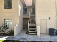 Building Photo - Condo 3 bedrooms 2 bathrooms 1 car garage gated subdivision.