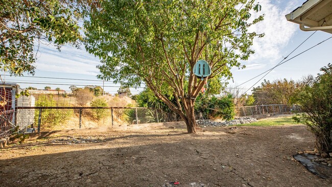 Building Photo - 4 Bedroom home with RV parking