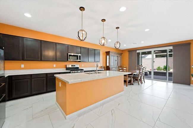 Building Photo - Upgragded 4-Bedroom Home with Casita in Gated Community