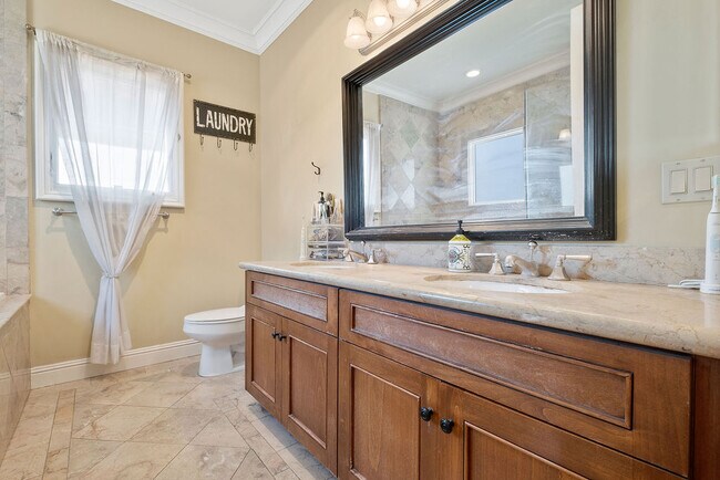 Master bath with dual sinks - 108 S El Molino Ave