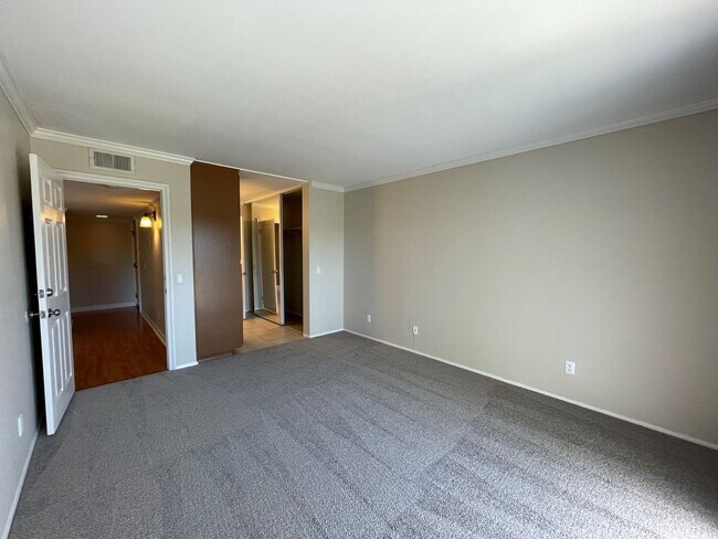 Building Photo - $500 Move In Special-Spacious Condo with Dual Master Suites Just Minutes Away from SDSU