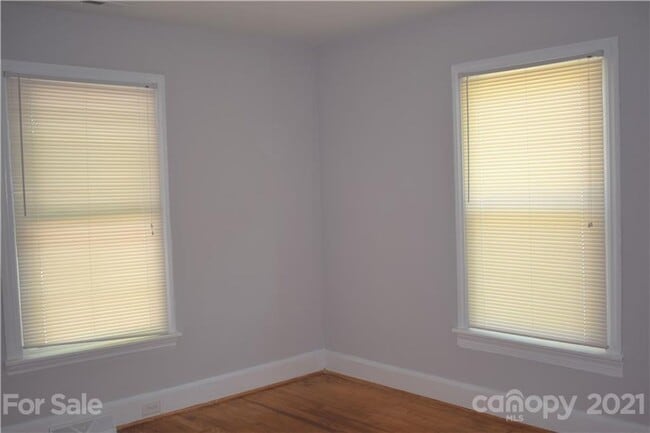 Building Photo - Charming 2-BR Brick Home with a Yard, and everything you need – Minutes from Downtown!