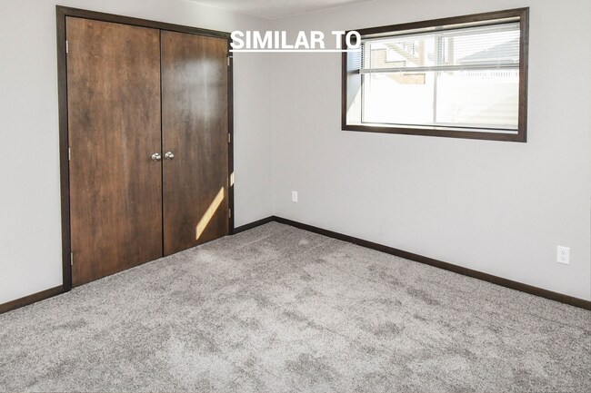 Building Photo - East Sioux Falls 4-Bedroom Townhome – Style, Space & Convenience!
