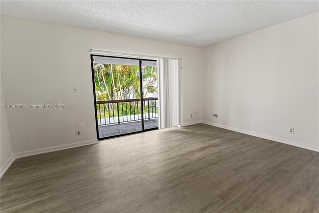 Building Photo - 6556 Racquet Club Dr