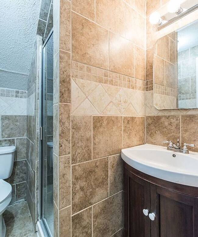 Building Photo - Spacious 4-Bedroom, 2-Bath Home with Garage, Side Parking & Private Backyard