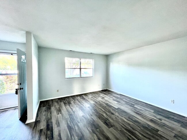 Building Photo - Three-bedroom, two-and-a-half bathrooms in...