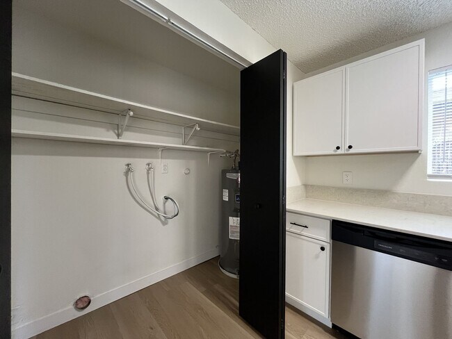 Building Photo - Inviting 2 Bedroom Home with Open Layout, Stainless Steel Appliances & Private Outdoor Retreat
