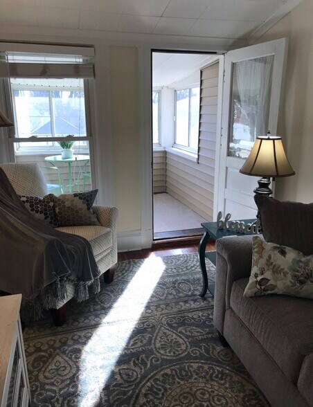 Living room opens onto front porch - 111 Lyman St