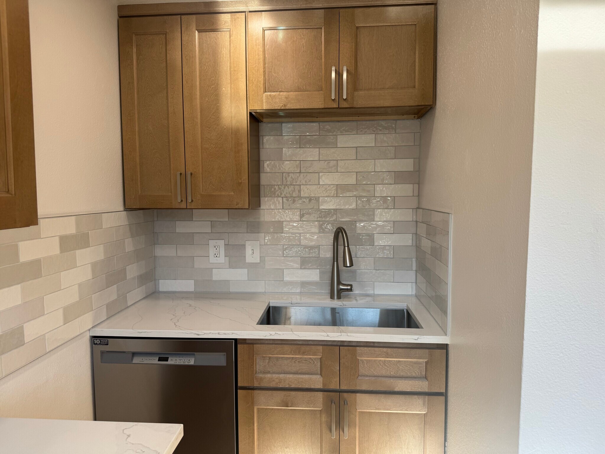 Large sink and Maytag dishwasher - 3948 S Brandon St