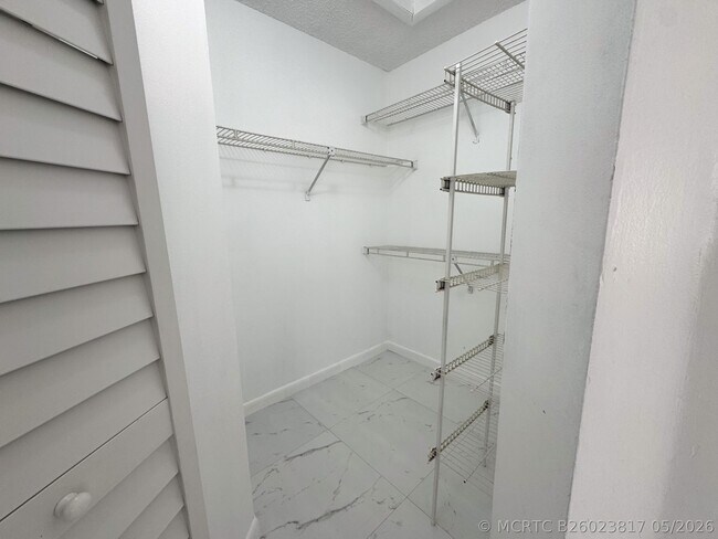 Building Photo - 10687 Royal Palm Blvd