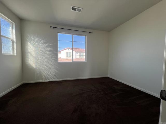Building Photo - 1707 Frangipani Ave