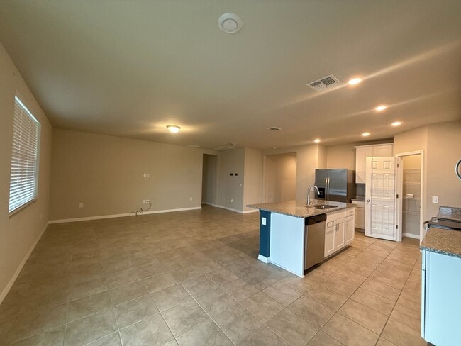 Building Photo - Stunning 4-bedroom, 3-bathroom, 2-stall garage, home. The only thing missing is you.