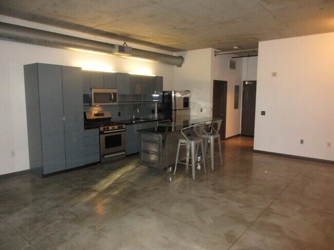 Building Photo - Streetcar Lofts - studio with 1 parking sp...